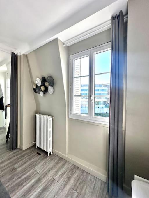 ג'נטילי Appartement Vue Tour Eiffel Ligne 14 A Cote De Paris מראה חיצוני תמונה